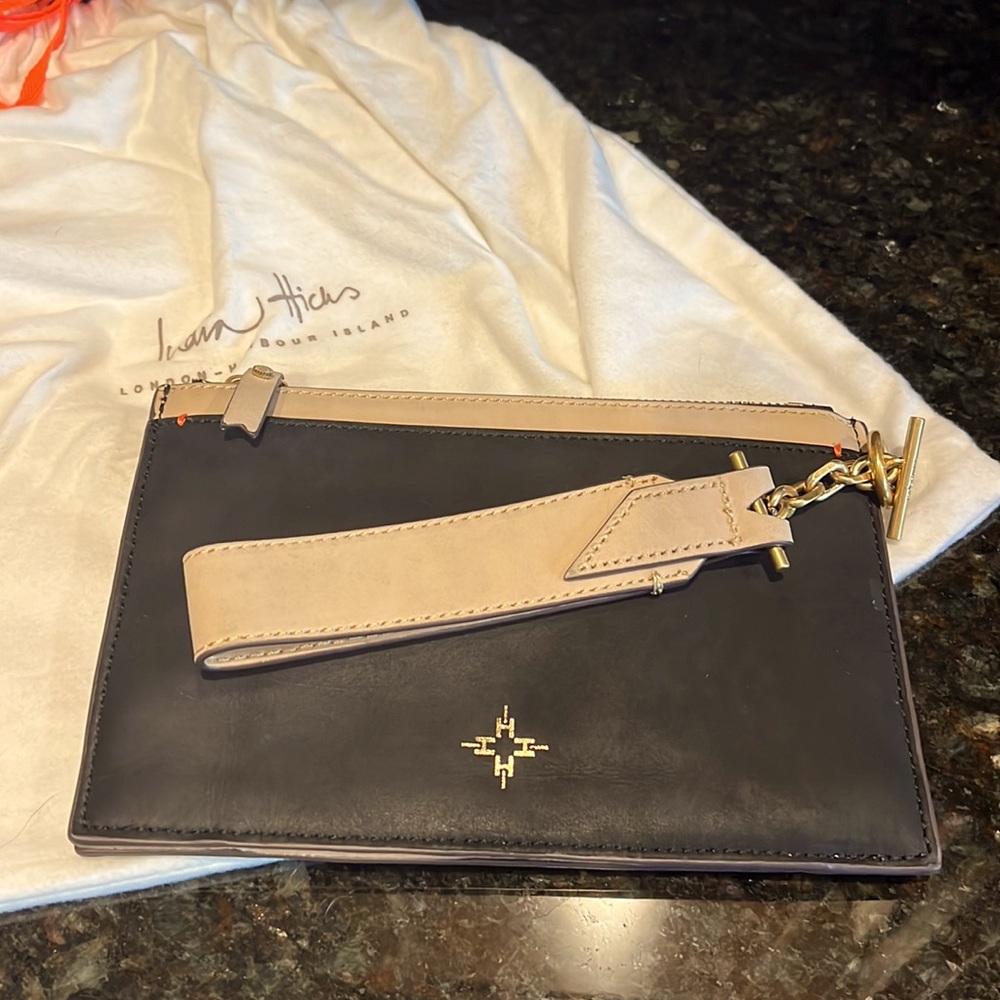 Like New India Hicks Wristlet in Black/Tan